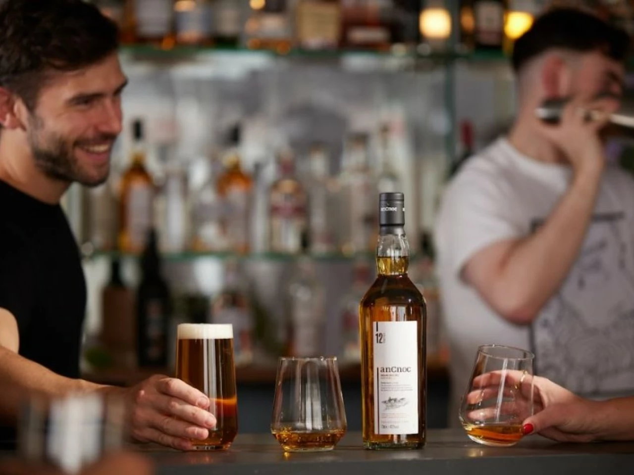anCnoc Single Malt Scotch Whisky being enjoyed at a bar