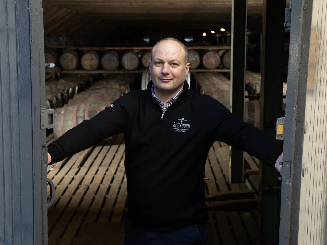 Speyburn Distillery Manager Euan Henderson, opening the doors to the dunnage warehouse 